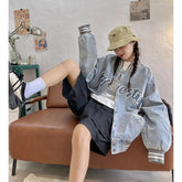 Jeansjacke mit amerikanischem Print